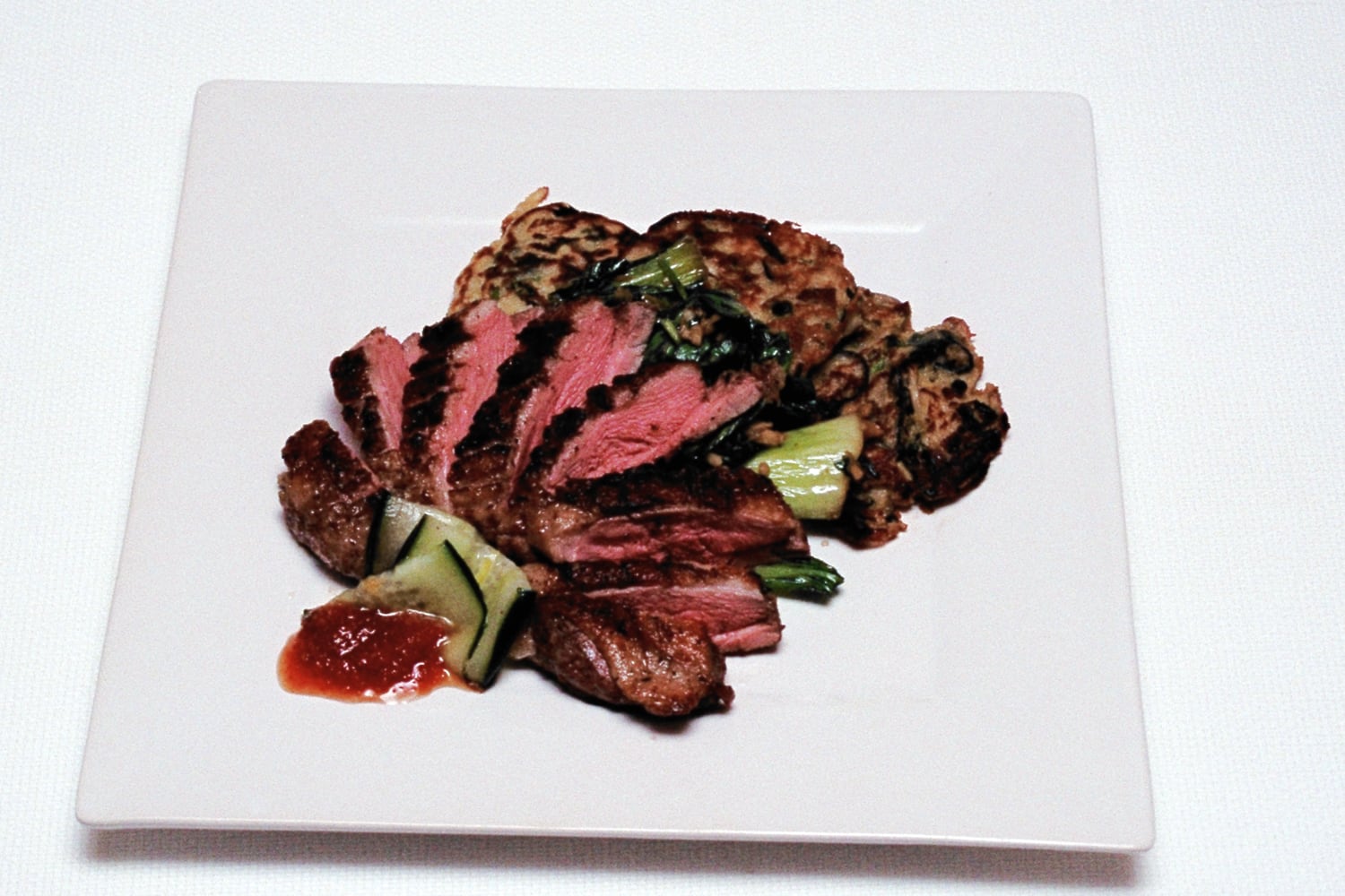 Tea Smoked Duck Breast with Bok Choy and Asian Mushroom Pancakes