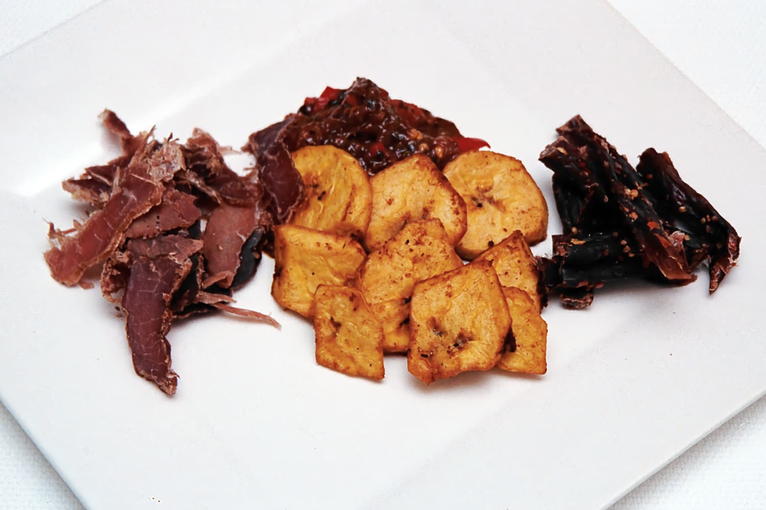 Plantain Chips served with various meats