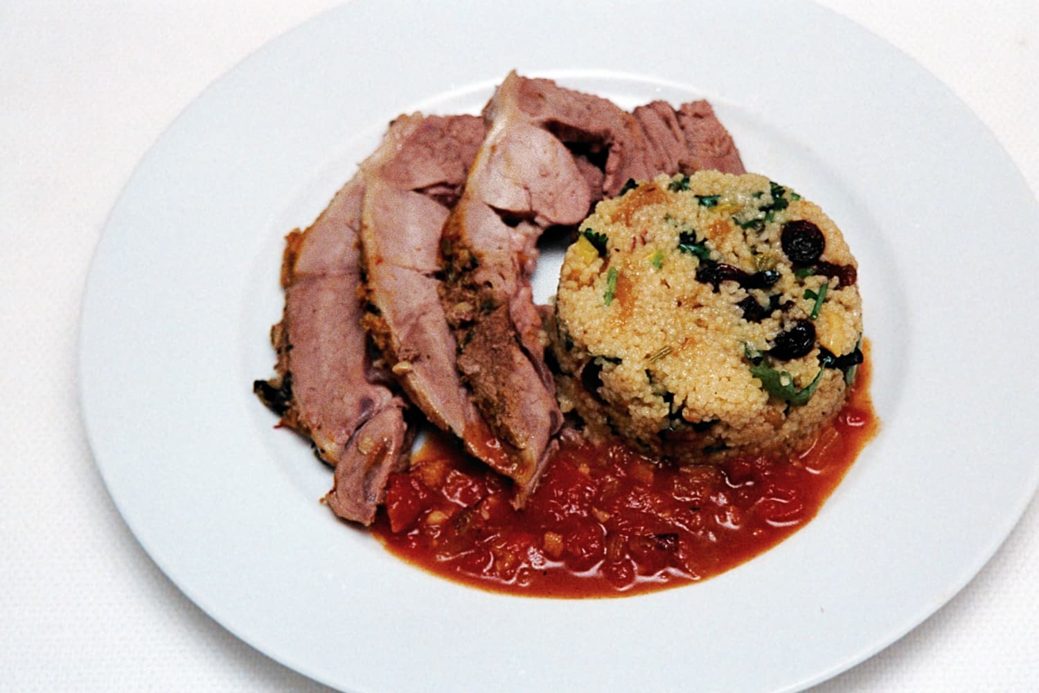 Steamed North African Leg of Lamb with Fruit Cous Cous served