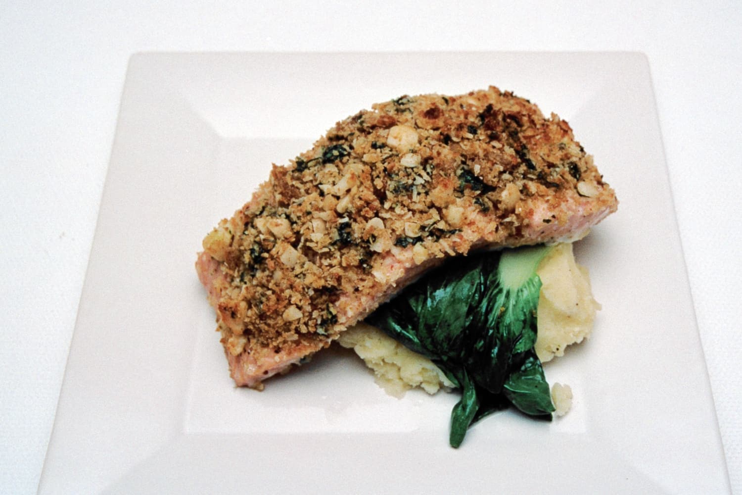 Macadamia and Coconut Crusted Salmon Fillets on Pak Choi and Mash