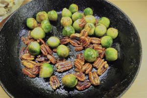 Sauté the Brussle Sprouts and Pecans in butter